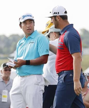 Golf: Matsuyama at U.S. Open 1st round Japan s Hideki Matsuyama (L) chats with Jon Rahm of Spain on the 10th hole during the first round of the U.S. Open Championship at Erin Hills in Erin, Wisconsin, on June 15, 2017. After shooting a 2-over 74, Matsuyama sat in a tie for 82nd place. 