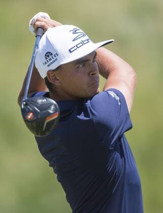Rickie Fowler hits off the 1st tee during round 2 of the 117th U.S. Open golf tournament at Erin Hill golf course in Erin, Wisconsin on June 16, 2017.  WIS20170616341 KEVINxDIETSCH