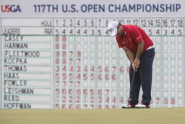 Patrick Reed putt on the 18th green during round 3 of the 117th U.S. Open golf tournament at Erin Hill golf course on June 17, 2017 in Erin, Wisconsin.  WIS20170617303 KEVINxDIETSCH