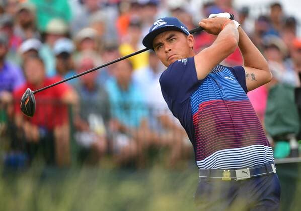 Rickie Fowler hits off the 1st tee during round 3 of the 117th U.S. Open golf tournament at Erin Hill golf course on June 17, 2017 in Erin, Wisconsin.  WIS20170617313 KEVINxDIETSCH