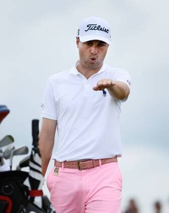 Justin Thomas reacts after making a birdie putt on the 8th hole during round 3 of the 117th U.S. Open golf tournament at Erin Hill golf course on June 17, 2017 in Erin, Wisconsin.  WIS20170617102 BRIANxKERSEY