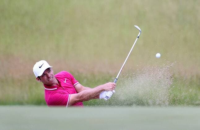 Paul Casey chips out of a greenside bunker on the 18th hole during round 3 of the 117th U.S. Open golf tournament at Erin Hill golf course on June 17, 2017 in Erin, Wisconsin.  WIS20170617132 BRIANxKERSEY