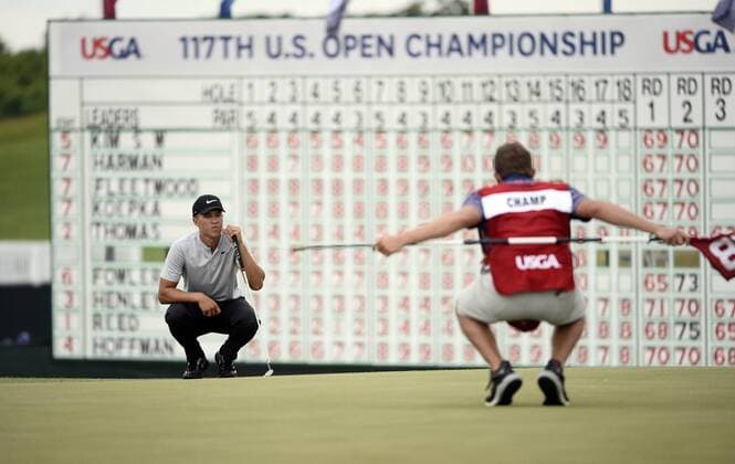 Cameron Champ, and amateur, line up his putt on the 18th hole during round 3 of the 117th U.S. Open golf tournament at Erin Hill golf course on June 17, 2017 in Erin, Wisconsin.  WIS20170617133 BRIANxKERSEY