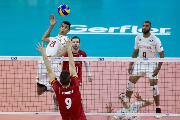 France s Barthelemy Chineneyeze and Red Dragons Pieter Verhees pictured during a World League game between the Red Dragons, Belgian national volleyball team and France, Sunday 18 June 2017, at the Lotto Arena in Antwerp. KRISTOFxVANxACCOM  x05114797x