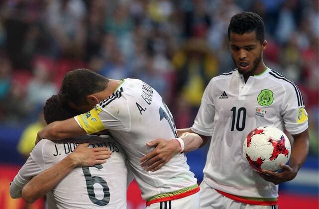 KAZAN, RUSSIA - JUNE 18, 2017: Mexico s Jonathan dos Santos (6), Andres Guardado (18), and Giovani dos Santos (10) celebrate a goal against Portugal in their 2017 FIFA Confederations Cup First Stage Group A football match at Kazan Arena Stadium; the match ended in a 2-2 draw. Yegor Aleyev TASS  TS053845