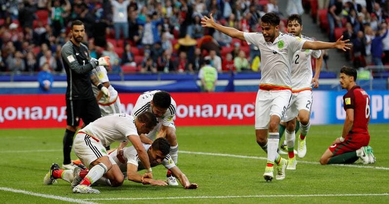 Soccer Football - Portugal v Mexico - FIFA Confederations Cup Russia 2017 - Group A - Kazan Arena, Kazan, Russia - June 18, 2017 MexicoÕs Hector Moreno celebrates scoring their second goal with Javier Hernandez and Oribe Peralta FOOTBALL : Portugal vs Mexique - Coupe Des Confederations - Kazan - 18 06 2017 ActionImages Panoramic  VPC_12