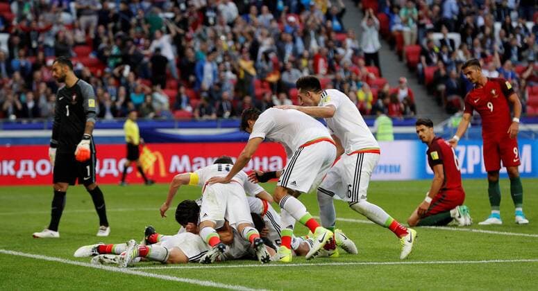 Soccer Football - Portugal v Mexico - FIFA Confederations Cup Russia 2017 - Group A - Kazan Arena, Kazan, Russia - June 18, 2017 MexicoÕs Hector Moreno celebrates scoring their second goal with teammates FOOTBALL : Portugal vs Mexique - Coupe Des Confederations - Kazan - 18 06 2017 ActionImages Panoramic  VPC_12