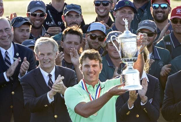 Brooks Koepka holds the trophy after his victory in the 117th U.S. Open golf tournament at Erin Hills golf course on June 18, 2017, in Erin, Wisconsin. Koepka posted a final score of 16-under-par.  WIS20170618579 BRIANxKERSEY