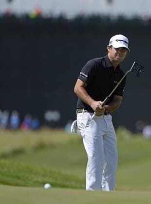 Brian Harman putts for birdie on No. 1 but manages par during the final round of the 117th U.S. Open golf tournament at Erin Hills golf course on June 18, 2017, in Erin, Wisconsin.  WIS20170618529 BRIANxKERSEY