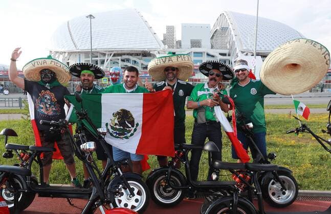 SOCHI, RUSSIA â€“ JUNE 21, 2017: Mexican fans waving a national flag ahead of the 2017 FIFA Confederations Cup Group B match against New Zealand at Fisht Stadium. Sergei Fadeichev TASS  TS05407E