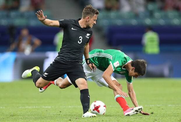 SOCHI, RUSSIA â€“ JUNE 21, 2017: New Zealand s Deklan Wynne (L) and Mexico s Jurgen Damm fight for the ball in their 2017 FIFA Confederations Cup Group A match at Fisht Stadium. Artyom Korotayev TASS  TS054180