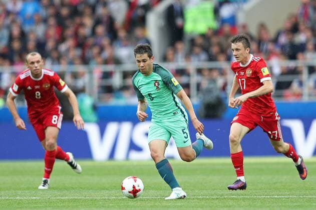 Russia vs Portugal MOSCOU, MO - 21.06.2017: RUSSIA VS PORTUGAL - GOLOVIN Russia& 39;s Aleksandr is in contention with RAPHAEL GUERREIRO of Portugal during a mabetween Russia and Portugal valid for the see second round of the 2017 Confederations Cup on Wednesday (21), held at the Spartak Stadium (Otkrytie Arena) in Moscow, Russia . (Photo: Heuler Andrey DiaEsportivo Fotoarena) x1341649x  HeulerxAndrey