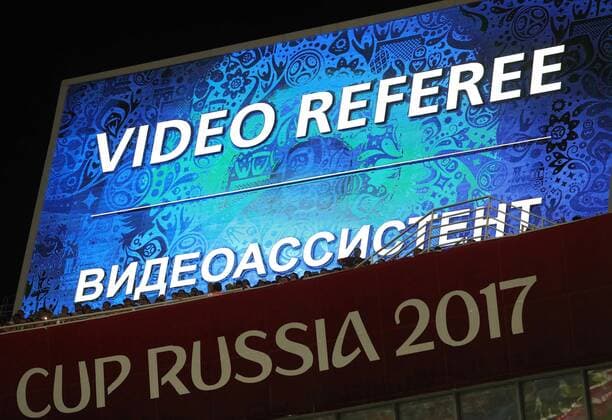 SOCHI, RUSSIA â€“ JUNE 21, 2017: A message on the screen reads Video Assistant Referee (VAR) during the 2017 FIFA Confederations Cup Group A match between Mexico and New Zealand at Fisht Stadium. Mexico won the game 2-1.Artyom Korotayev TASS  TS054211