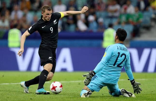 SOCHI, RUSSIA â€“ JUNE 21, 2017: New Zealand s Chris Wood (L) attacks Mexico s goalkeeper Alfredo Talavera in their 2017 FIFA Confederations Cup Group A match at Fisht Stadium. Mexico won the game 2-1.Artyom Korotayev TASS  TS0541D2