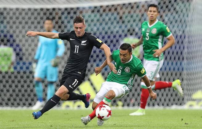 SOCHI, RUSSIA â€“ JUNE 21, 2017: Mexico s Marco Fabian (L) and New Zealand s Marco Fabian in action in their 2017 FIFA Confederations Cup Group A match at Fisht Stadium. Mexico won the game 2-1.Artyom Korotayev TASS  TS05421E