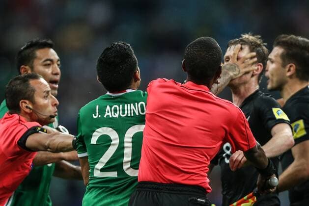 (170622) -- SOCHI, June 22, 2017 -- Referees attempt to separate players as they fight during the group A match between Mexico and New Zealand of the 2017 FIFA Confederations Cup in Sochi, Russia, on June 21, 2017. Mexico won 2-1. ) (SP)RUSSIA-MOSCOW-FIFA-CONFED CUP-MEX VS NZL WuxZhuang 