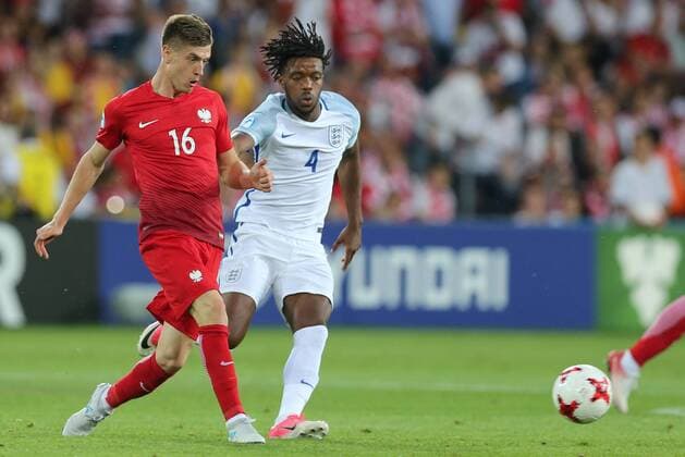 June 22, 2017 - Kielce, Poland - Krzysztof Piatek (POL), Nathaniel Chalobah (ENG), during the UEFA European Under-21 Championship Group A match between England and Poland at Kielce Stadium on June 22, 2017 in Kielce, Poland. England v Poland - 2017 UEFA European Under-21 Championship  - ZUMAn230 20170622_zaa_n230_384 Copyright: xFotoxOlimpikx
