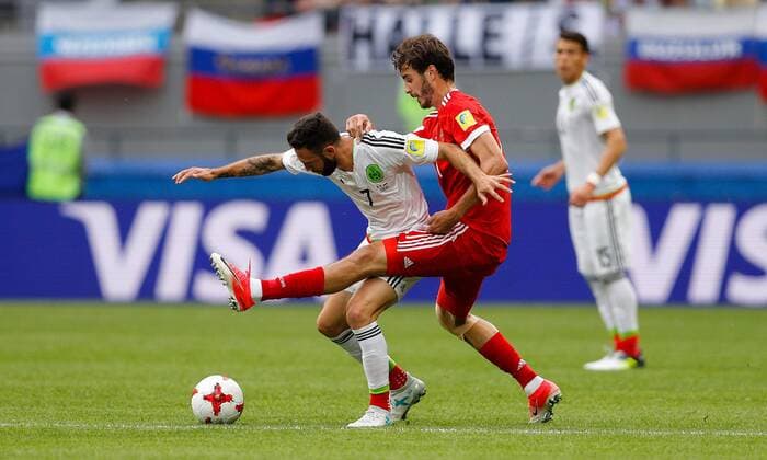 Mexico vs. Russia SAO PETERSBURGO, MO - 24.06.2017: MEXICO VS. RUSSIA - LAYUN Miguel of Mexico fights ball with ZHIRKOV Yury of Russia during match between Mexico and Russia valid for the third round of the Confederations Cup 2017, this Saturday (24) held Arena Kazan in Kazan, Russia. (Photo: Marcelo Machado de Melo Fotoarena) x1343477x  MarceloxMachadoxdexMelo