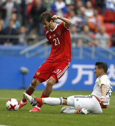 Mexico vs. Russia SAO PETERSBURGO, MO - 24.06.2017: MEXICO VS. RUSSIA - Aleksandr EROKHIN of Russia contests ball with MORENO Hector of Mexico during Mexico-Russia match valid for the third round of the Confederations Cup 2017 on Saturday (24) held at Kazan Arena Stadium in Kazan, Russia. (Photo: Rodolfo Buhrer La Imagem Fotoarena) x1343523x  RodolfoxBuhrer
