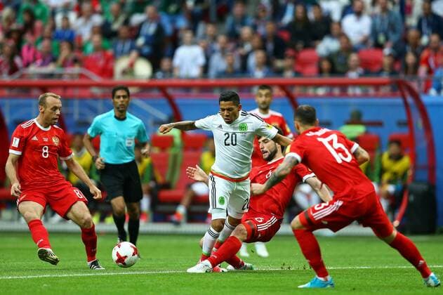 Mexico vs. Russia SAO PETERSBURGO, MO - 24.06.2017: MEXICO VS. RUSSIA - Mexico& 39;s Javier Aquino is bidding with Dzhikya Georgy of Russia during a match between Mexico and Russia valid for third roundound of the 2017 Confederations Cup on Saturday (24) held at the Kazan Arena in Kazan, Russia. (Photo: Heuler Andrey DiaEsportivo Fotoarena) x1343551x  HeulerxAndrey