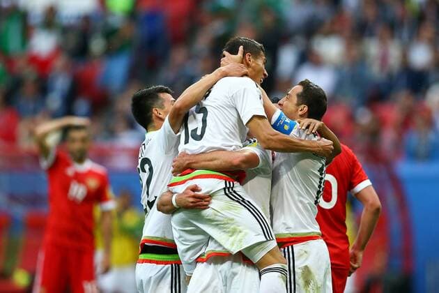 Mexico vs. Russia SAO PETERSBURGO, MO - 24.06.2017: MEXICO VS. RUSSIA - Mexico players celebrate goal during Mexico-Russia match valid for the third round of the 2017 Confederations Cup on Saturday (24) held at the Kazan Arena in Kazan, Russia. (Photo: Heuler Andrey DiaEsportivo Fotoarena) x1343566x  HeulerxAndrey