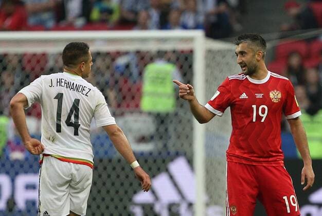 KAZAN, RUSSIA - JUNE 24, 2017: Mexico s Javier Hernandez (14), and Russia s Alexander Samedov in their 2017 FIFA Confederations Cup First Stage Group A football match at Kazan Arena Stadium; Mexico won the game 2-1. Yegor Aleyev TASS  TS054A47