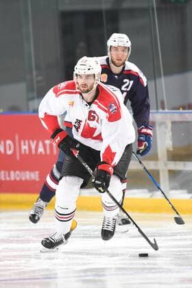 24th June 2017; Hisense Arena, Melbourne, Victoria, Australia; Hungry Jack International Ice hockey Eishockey challenge, Canada versus USA; Ben Harpur of Canada preparing to pass the puck xMorganxHancockx  ActionPlus11893833