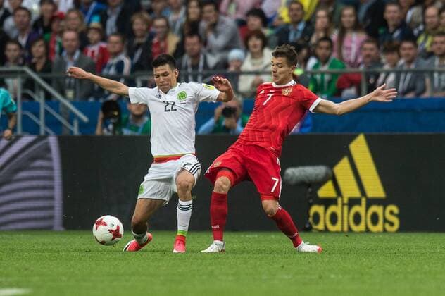 (170625) -- KAZAN, June 25, 2017 -- Dmitry Poloz (R) of Russia vies with Hirving Lozano of Mexico during group A match between Russia and Mexico at the 2017 FIFA Confederations Cup in Kazan, Russia, on June 24, 2017. Mexico won 2-1. ) (SP)RUSSIA-KAZAN-FIFA-CONFED CUP-RUS VS MEX EvgenyxSinitsyn 