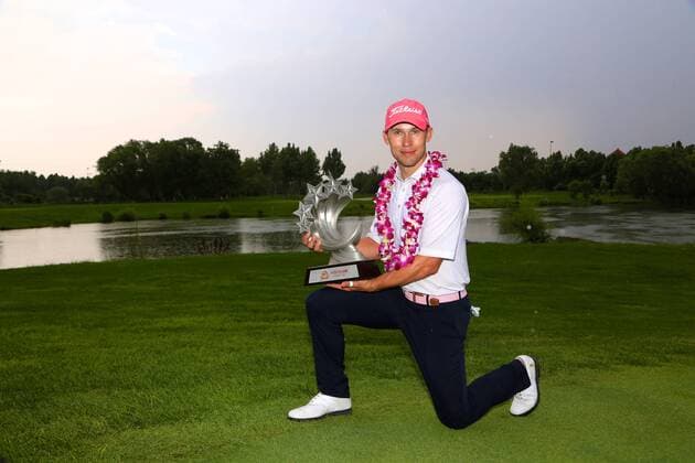 Bryden Macpherson of Australia poses with his trophy after winning the final round of 2017 the Fragrant Hills International Beijing Open golf tournament in Beijing, China, 25 June 2017. Australian golfer Bryden Macpherson ranked the top on the China Tour Order of Merit this week when the second event of the newly formed circuit s 2017 season gets underway in Beijing. The Tour recently cut ties with the PGA Golf Herren TOUR and is now run by the China Golf Association with ties to both the European and Asian Tours. The Fragrant Hills International Beijing Open, which is the second stop on the China Tour, is set to welcome 141 players from 17 countries when it tees off from June 22-25. Bryden Macpherson titles Fragrant Hills International Beijing Open  20170625_82722