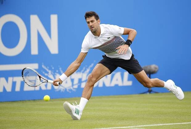 June 28th 2017, Devonshire Park, Eastbourne, England; Aegon International Eastbourne; Novak Djokovic (SRB) versus Vasek Pospisil (CAN); Djokovic hits a forehand as he wins his 2nd round match 6-4 6-3 xHongboxChenx  ActionPlus11894940