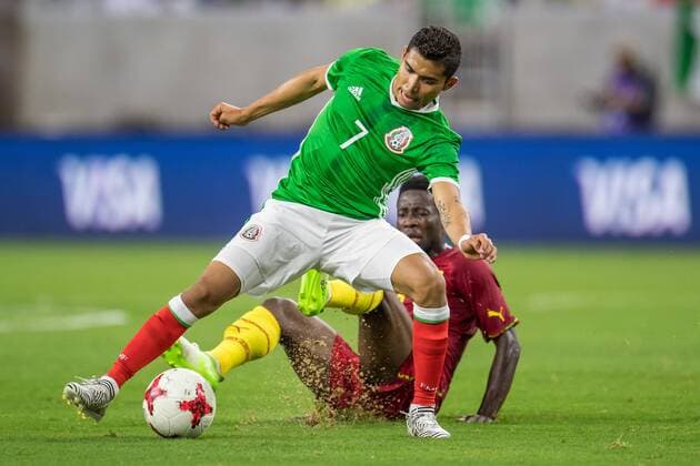 June 28, 2017: Mexico midfielder Orbelin Pineda (7) leaps past a tackle attempt by Ghana midfielder Ebenezer Ofori (8) during the 2nd half of an international soccer friendly match between Mexico and Ghana at NRG Stadium in Houston, TX. Mexico won the game 1-0... CSM Soccer 2017: Ghana vs Mexico JUN 28 - ZUMAc04_ 20170628_zaf_c04_024 Copyright: xTraskxSmithx