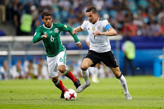 Germany vs Mexico SOCHI, SC - 29.06.2017: GERMANY VS MEXICO - DOS SANTOS Jonathan of Mexico plays the ball with DRAXLER Julian of Germany during a match between Germany and Mexico valid for the semifinals of the 2017 Confederations Cup on Thursday (29th) held at the Olympic Stadium in Sochi, Russia (Photo: Marcelo Machado de Melo Fotoarena) x1347234x  MarceloxMachadoxdexMelo