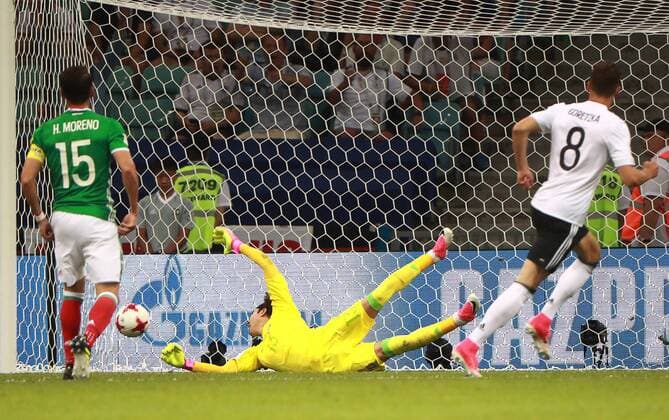 SOCHI, RUSSIA - JUNE 29, 2017: Mexico s goalkeeper Guillermo Ochoa (C) concedes a goal in the 2017 FIFA Confederations Cup semifinal football match against Germany at Fisht Stadium. Sergei Fadeichev TASS  TS0557BB