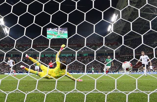 SOCHI, RUSSIA - JUNE 29, 2017: Mexico s goalkeeper Guillermo Ochoa (L) concedes a goal in the 2017 FIFA Confederations Cup semifinal football match against Germany at Fisht Stadium. Artyom Korotayev TASS  TS0557CC