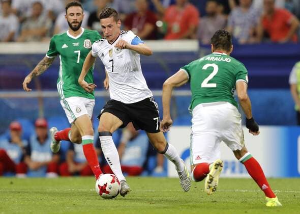Germany vs Mexico SOCHI, SC - 29.06.2017: GERMANY VS MEXICO - Julian DRAXLER of Germany contests ball with ARAUJO Nestor of Mexico during match between Germany and Mexico valid for the semifinals of the 2017 Confederations Cup, this Thursday (29), held in the Sochi Olympic Stadium in Sochi, Russia. (Photo: Rodolfo Buhrer La Imagem Fotoarena) x1347407x  RodolfoxBuhrer