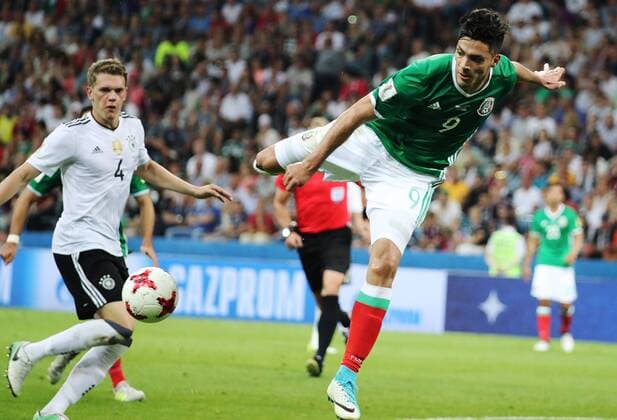 SOCHI, RUSSIA - JUNE 29, 2017: Germany s Matthias Ginter (L) and Mexico s Raul Jimenez fight for the ball in their 2017 FIFA Confederations Cup semifinal football match at Fisht Stadium. Germany won the game 4-1. Artyom Korotayev TASS  TS055844
