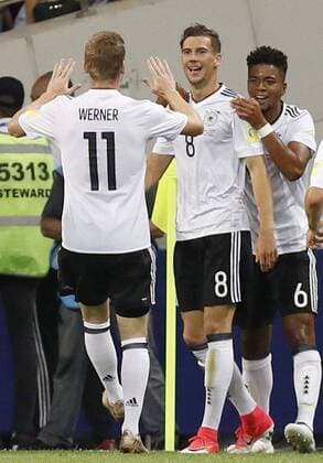 Soccer: Germany set up Confederations Cup final with Chile Leon Goretzka (8) is congratulated by Germany teammates Benjamin Henrichs (6) and Timo Werner after scoring his second goal during the first half of a 4-1 win over Mexico in their Confederations Cup semifinal in Sochi, Russia, on June 29, 2017. Germany will face Chile in the July 2 final. 