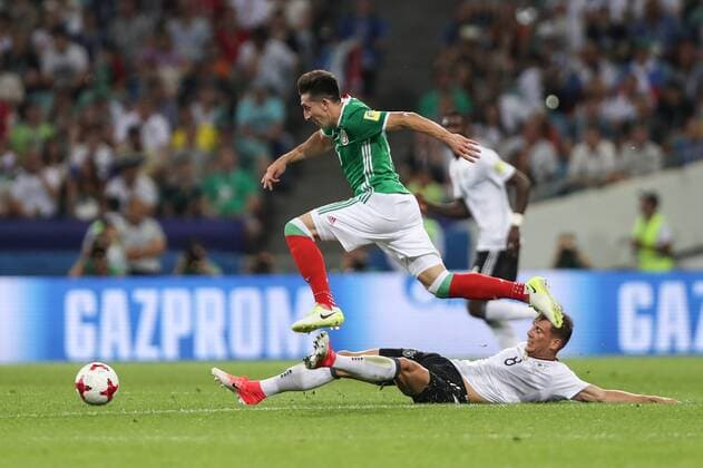 (170630) -- SOCHI, June 30, 2017 -- Hector Herrera (top) of Mexico breaks through over Leon Goretzka of Germany during the semifinal match of the 2017 FIFA Confederations Cup in Sochi, Russia, June 29, 2017. Mexico lost 1-4. ) (SP)RUSSIA-SOCHI-2017 FIFA CONFEDERATIONS CUP-SEMIFINAL-GER VS MEX WuxZhuang 