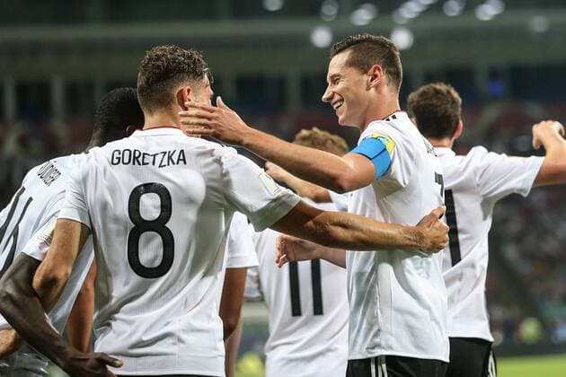 (170630) -- SOCHI, June 30, 2017 -- Julian Draxler (front R) of Germany congratulates Leon Goretzka for his goal during the semifinal match of the 2017 FIFA Confederations Cup against Mexico in Sochi, Russia, June 29, 2017. Germany won 4-1. ) (SP)RUSSIA-SOCHI-2017 FIFA CONFEDERATIONS CUP-SEMIFINAL-GER VS MEX WuxZhuang 