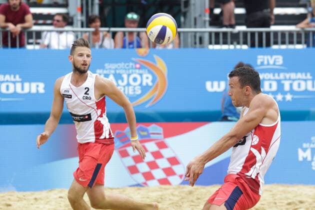PXL_Swatch Beach volleyball Beachvolleyball Mayor Series in Porec 30.06.2017., Porec, Croatia - Swatch Beach Volleyball Mayor Series, match Perisic Dell Orco of Croatia against Gibb Crabb of USA. Ivan Perisic.  LukaxStanzl PIXSELL