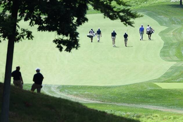 JUL 01, 2017 - Golfers make their way down the tenth fairway during the third round at the 2017 Quicken Loans National at the Tournament Players Club in Potomac MD. PGA Golf Herren 2017: Quicken Loans National JUL 01 - ZUMAcjm_ 20170701_zaf_cjm_009 Copyright: xJohnxMiddlebrookx