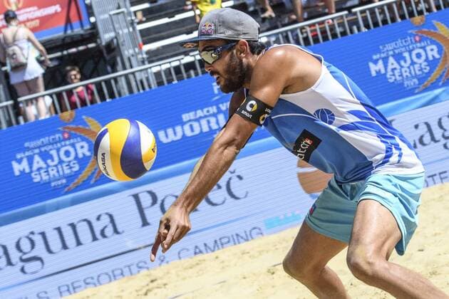 POREC, CROATIA - JULY 01: Daniele Lupo of Italy receives the ball during the Quarter Final game against Jake Gibb and Taylor Crabb of USA during the Swatch Beach volleyball Beachvolleyball Major Series 2017 on July 1, 2017 in Porec, Croatia. (Photo by Mihai Stetcu Hoch Zwei) Porec Croatia xHOCHxZWEIx
