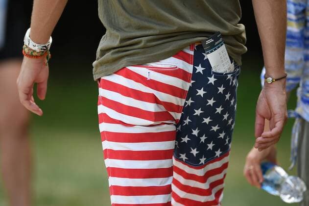 JUL 01, 2017 - A fan wearing his stars and stripes walks down the eight fairway during the third round at the 2017 Quicken Loans National at the Tournament Players Club in Potomac MD. PGA Golf Herren 2017: Quicken Loans National JUL 01 - ZUMAcjm_ 20170701_zaf_cjm_035 Copyright: xJohnxMiddlebrookx