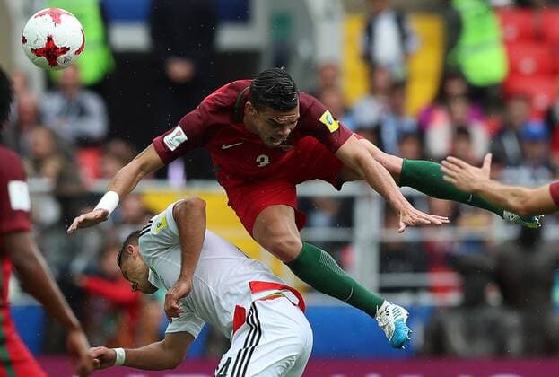 MOSCOW, RUSSIA â€“ JULY 2, 2017: Mexicoâ€™s Rafael Marquez (L) and Portugalâ€™s Pepe struggle for the ball in their 2017 FIFA Confederations Cup third place football match at Otkrytie Arena. Sergei Savostyanov TASS  TS055C50