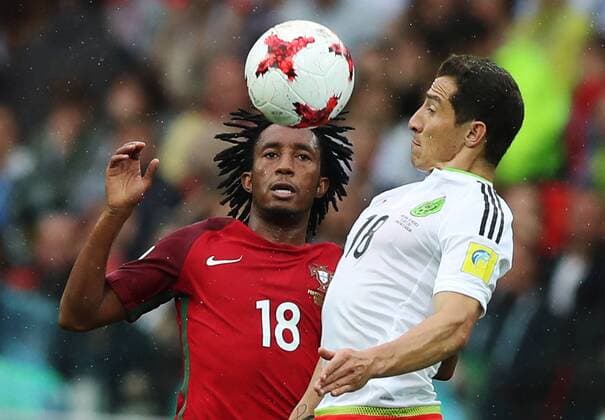 MOSCOW, RUSSIA â€“ JULY 2, 2017: Portugalâ€™s Gelson Martins (L) and Mexicoâ€™s Andres Guardado struggle for the ball in their 2017 FIFA Confederations Cup third place football match at Otkrytie Arena. Sergei Savostyanov TASS  TS055C74