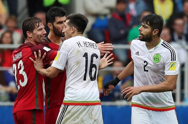 MOSCOW, RUSSIA â€“ JULY 2, 2017: Portugal s Adrien Silva, Luis Neto talk to Mexico s Hector Herrera, Nestor Araujo (L-R) in their 2017 FIFA Confederations Cup third place football match at Spartak Stadium. Portugal won the game 2-1 in extra time and claimed bronze medals. Sergei Savostyanov TASS  TS055C9C