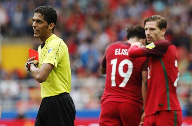 MOSCOW, RUSSIA â€“ JULY 2, 2017: Referee Fahad Al-Mirdasi (L) in the 2017 FIFA Confederations Cup third place football match between Portugal and Mexico at Spartak Stadium. Portugal won the game 2-1 in extra time and claimed bronze medals. Mikhail Japaridze TASS  TS055CAC