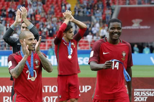 MOSCOW, RUSSIA â€“ JULY 2, 2017: Portugal s Ricardo Quaresma and William Carvalho (L-R front) pose with their bronze medals at an awards ceremony after winning their 2017 FIFA Confederations Cup third place football match against Mexico at Spartak Stadium. Portugal won the game 2-1 in extra time and claimed bronze medals. Mikhail Japaridze TASS  TS055CC5