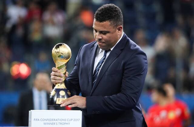 ST PETERSBURG, RUSSIA â€“ JULY 2, 2017: Retired Brazilian footballer Ronaldo holds the trophy at an awards ceremony after the 2017 FIFA Confederations Cup final football match between Chile and Germany at Saint Petersburg Arena Stadium. Germany won the game 1-0 and claimed their first Confederations Cup title. Valery Sharifulin TASS  TS055DF7