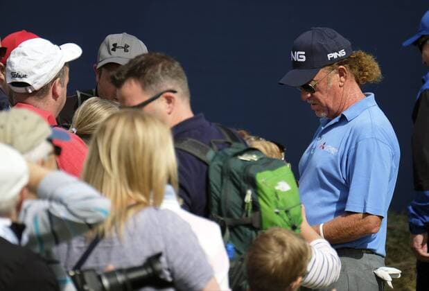 July 5th 2017, Portstewart Golf Club, Portstewart, Northern Ireland; Dubai Duty Free Irish Open Golf Championship; Pro-Am Tournament; Miguel Angel Jimenez (ESP) takes time to sign some autographs as he departs the 18th green xNigelxCookex  ActionPlus11897940